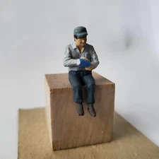 Arttista #1176 - Sitting Man with Bottle - O Scale Figure - Model Trains - NEW