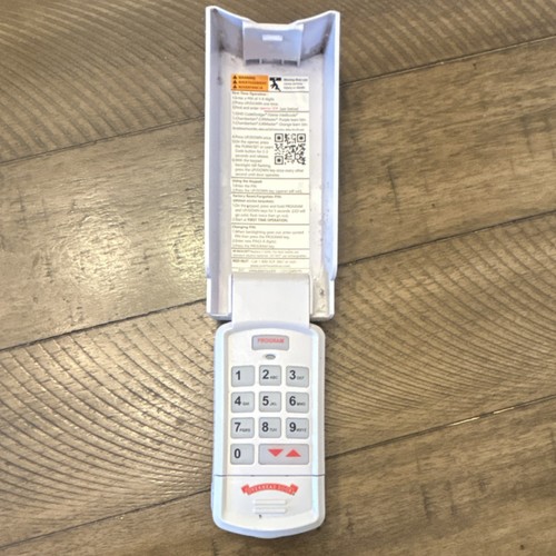Overhead Door Flip Garage Keypad White 12-Button Battery Operated Illuminated