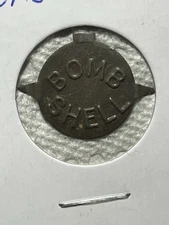 Bomb Shell embossed vintage tin tobacco tag