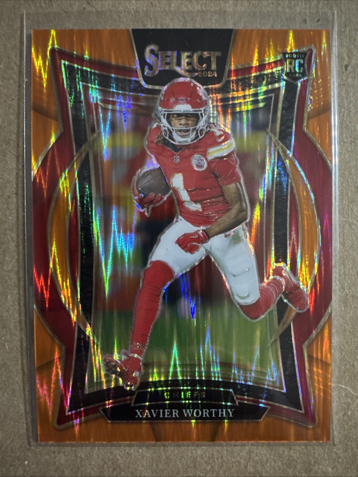 2024 Panini Select - Concourse Xavier Worthy #32 Orange Shock Prizm /499 (RC)