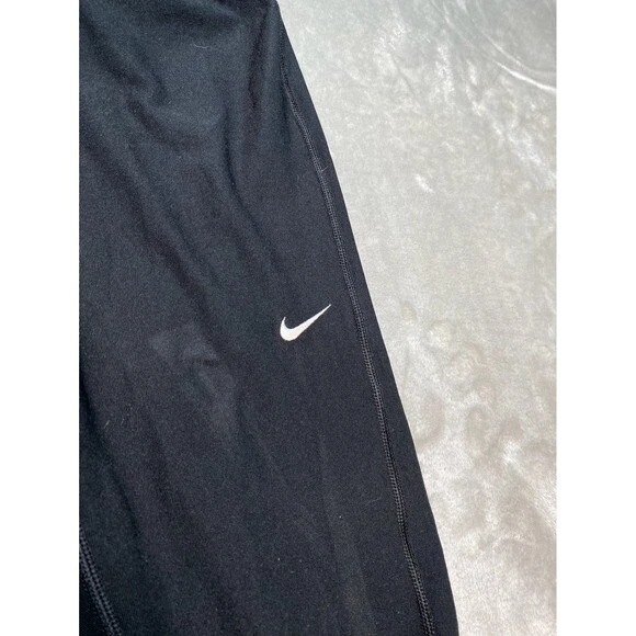 Nike Mallas para Correr Dri-FIT Grandes Leggings Atléticos Dobladillos con Cremallera Grandes Foto 2 de 4