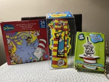 Three Dr. Seuss Items: Bookmarks, Silver, Plated, Ornament, And Puzzle