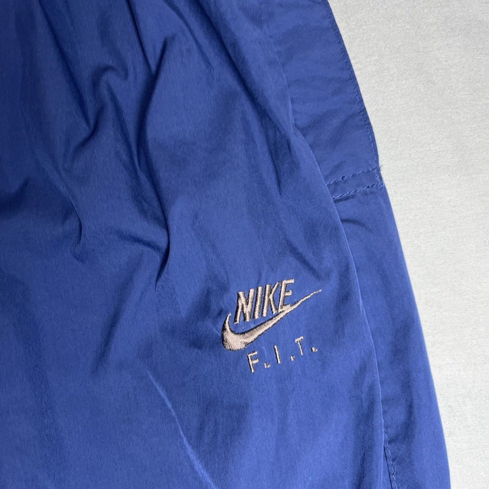 Pantalones de lluvia vintage Nike Golf Y2K para hombre cortavientos cremallera tobillo pista azul marino XL Foto 4 de 4