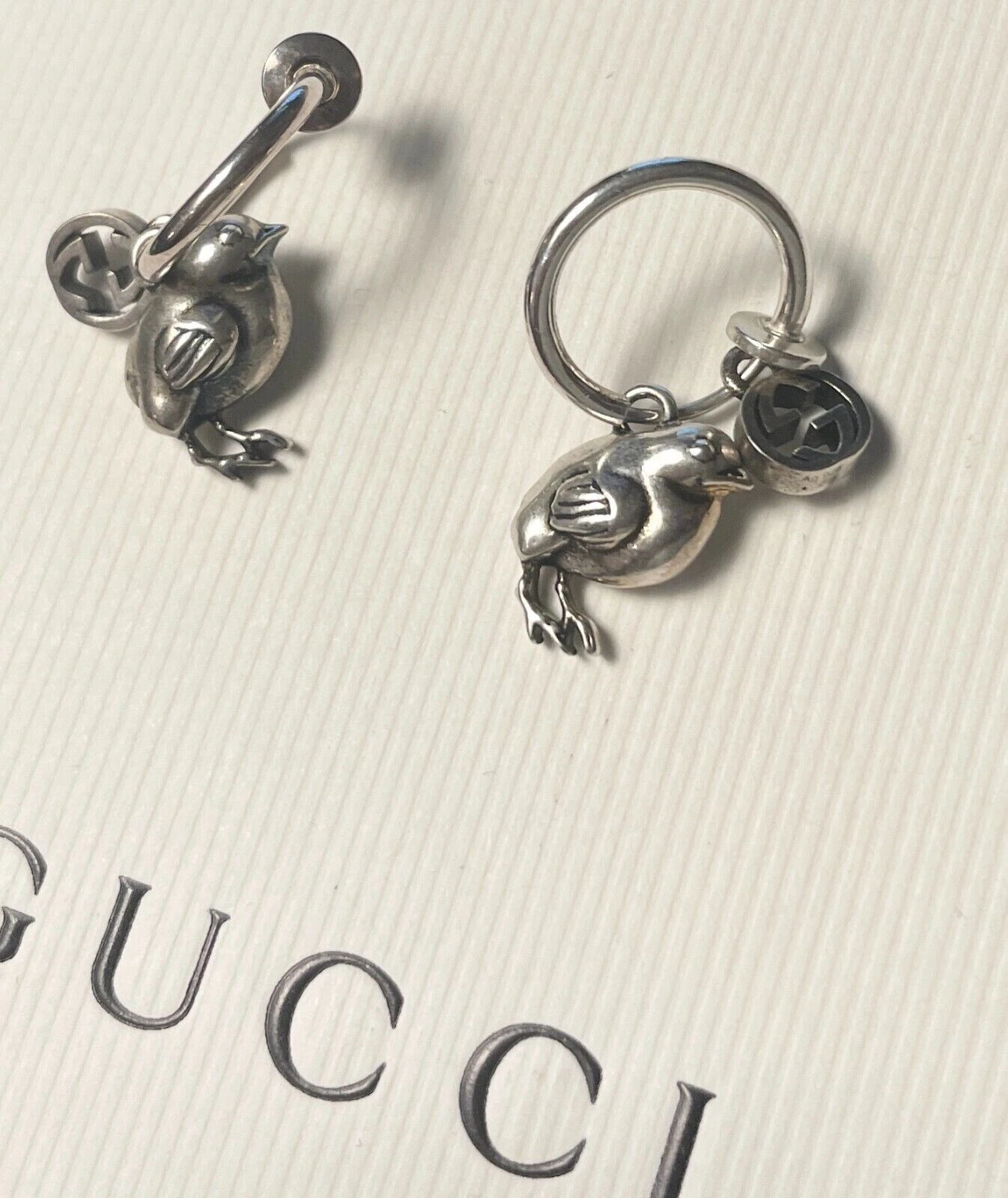 Boucles d'oreilles GUCCI avec tique imbriquée clip poussin 635772 argent 925