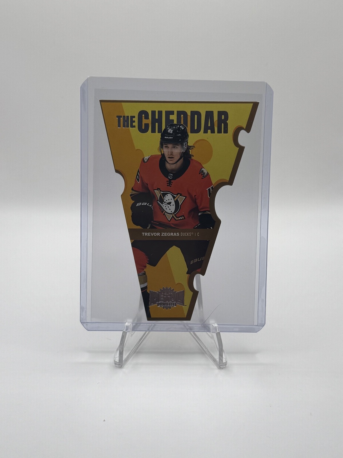 Trevor Zegras #TC-19 Hockey Cards 2021 Skybox Metal Universe The Cheddar trading card — raw and PSA graded price guide