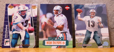 TRIO OF FOOTBALL CARDS SHOWCASING HIS TALENTS DAN MARINO OF THE MIAMI DOLPHINS