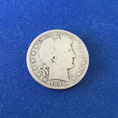 1894 Barber Half Dollar having good details and a decent low mintage coin.