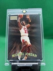 Michael Jordan Card AUTHENTIC GOLD HOLO FOIL AUTHENTIC INSERT BULLS JERSEY #23