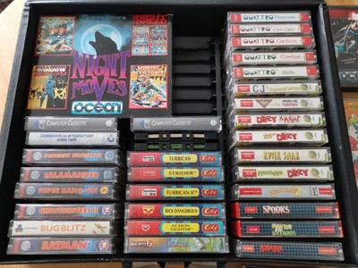 EINE AKTENTASCHE VON COMMODORE C64 / C128 KASSETTEN SPIELE