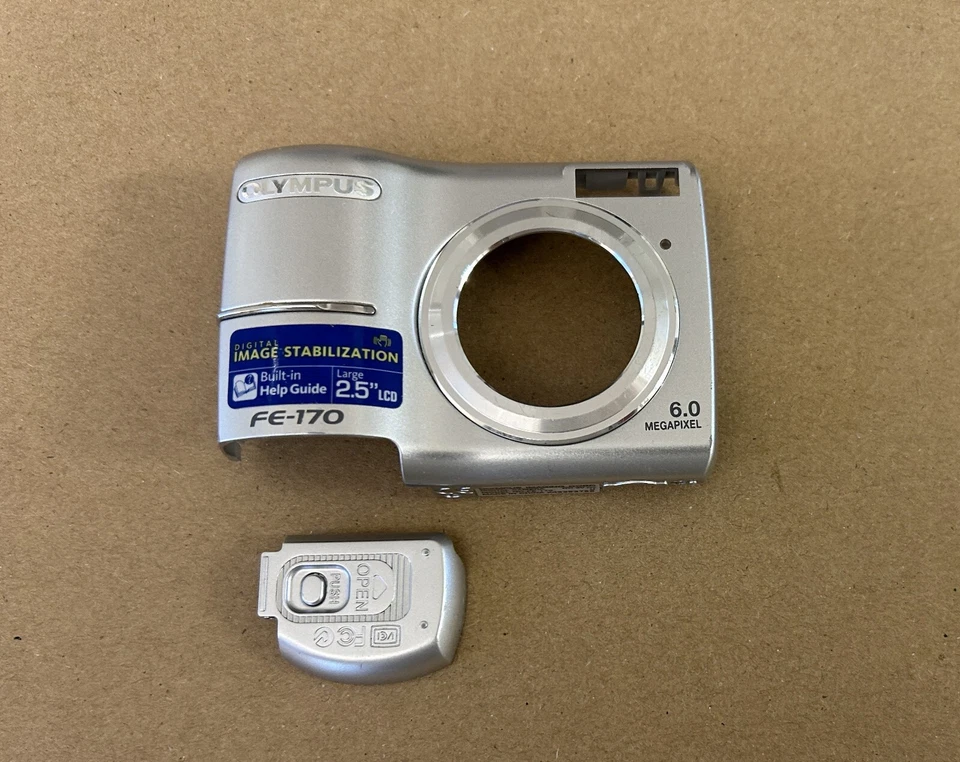 Puerta y panel frontal batería original (plateado) para cámara digital Olympus FE-170 Foto 2 de 4