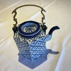 Unique Blue and White ceramic pitcher with metal handle