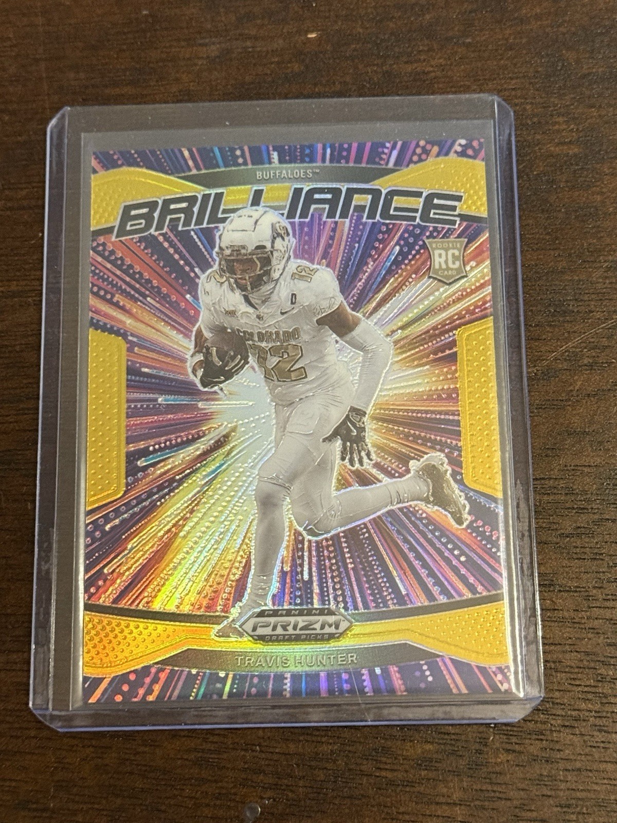 2025 Panini Prizm Draft Picks Gold Prizm Travis Hunter Brilliance Rookie #10/10