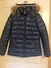 A Relaxed-fit Puffer Jacket With A Water Repellent Shell And A Hood
