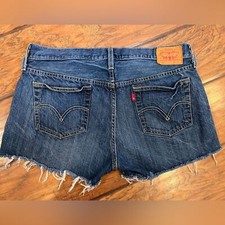 Levis 501 Vtg jean shorts women s 28 measures 31 blue cut off cotton Western