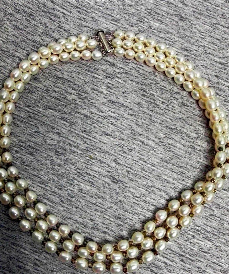Triple strand white round pearl necklace with sterling silver clasp