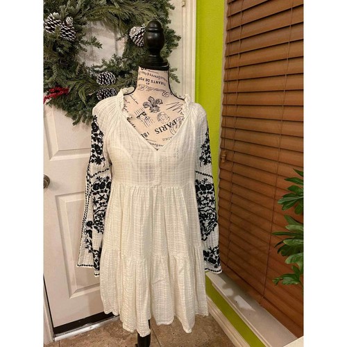 Free People’s white embroidered mini dress, xs Gem