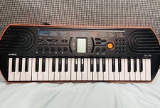 Casio SA-76 44-Key Electronic Keyboard Black/Orange Built-In Speaker AC Adapter