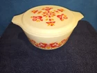 Vintage Pyrex Friendship pattern casserole dish with a lid. 2 1/2qt