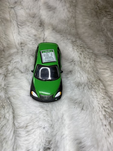 Johnny Lightning - North Caroline Ave - Chrome Green Chrysler PT Cruiser - Picture 3 of 5