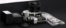 Minolta SR-T 101 Chrome 35mm Film SLR c/w MAGNUM 28mm f/2.8 Wide Lens Flash Kit