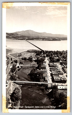 Main Street - Sandpoint, Idaho and 2 mile Bridge - Ross Hall - RPPC Postcard