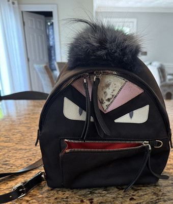 Fendi Black Monster Eyes Mini Backpack Zip Top Handle w/ Fur Pom Pom
