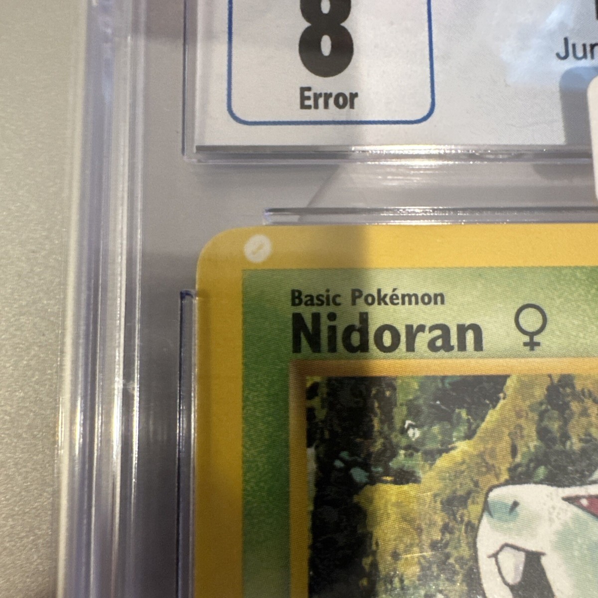 CGC 8 Pokémon TCG Nidoran Jungle 57/64 Regular Misprint Printer