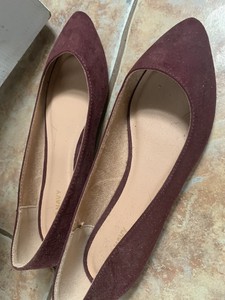 well worn ballet flats