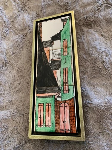 Hand painted ceramic tiles by artist Jacques DeClercq in frame