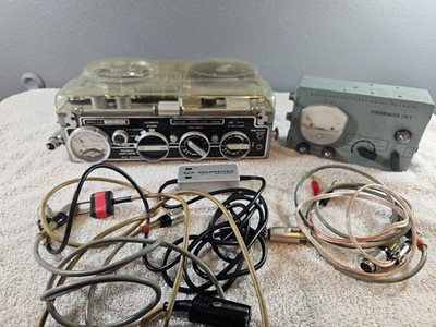 Nagra III Reel to reel with synchronizer/power supply. See it play!