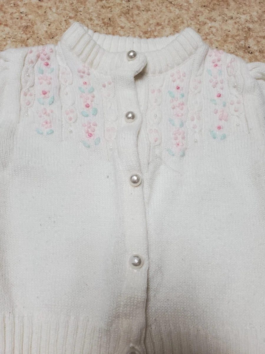 White cardigan top with pearls