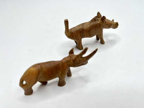 Figurines anciennes rhinocéros et porc verrues en bois sculpté - Photo 1/3