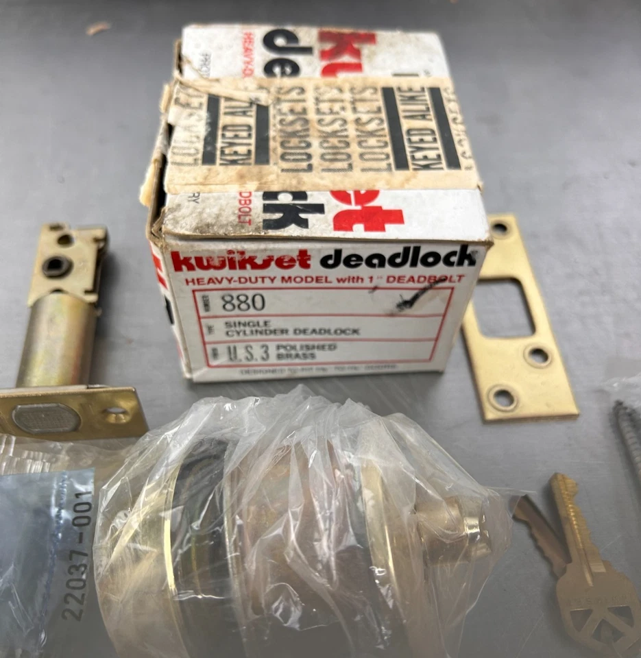 Kwikset Single Keyed Deadlock 880 EE. UU. 3 latón pulido nueva caja abierta Foto 3 de 4