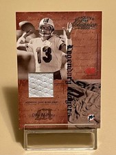 2004 DONRUSS CLASSICS LEGENDARY PLAYERS DAN MARINO WORN JERSEY #LP-4 / # 049/100