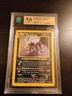 2001 Pokemon Neo Discovery 1st Edition Holo Houndoom #4/75 Grade 9 NM SWIRL