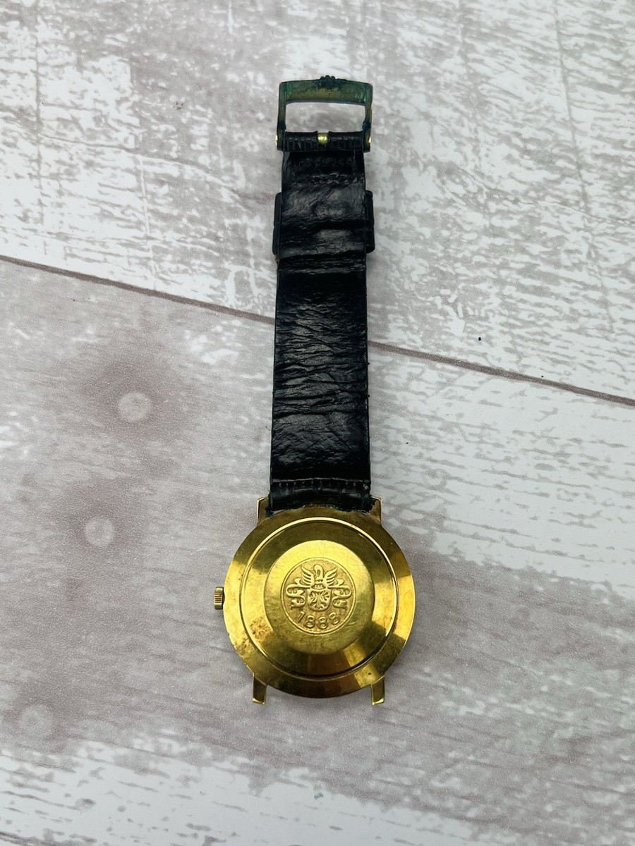Vintage Bucherer Men's wrist watch With medallion on back, as is