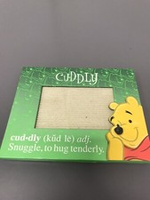 Walt Disney World Winnie the Pooh Cuddly Snuggle Green Frame Holds Photo Frame.