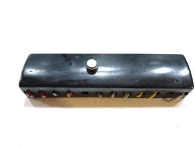 A used Fuse box for Porsche 356a/b/c models , with offset pin cover and sticker
