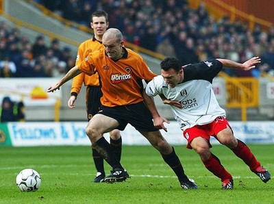 Alex Rae of Wolves holds back Steed Malbranque of Fulham at the FA- Old Photo