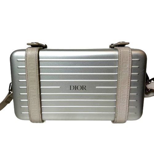 Pochette personnelle Christian Dior Dior x Rimowa aluminium argent authentifiée T2410M