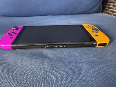 Nintendo Switch - OLED Model with original yellow -purple Joy-Cons