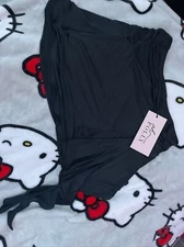 Slinky Jersey Mid Rise Ruffle Layer Mini Skirt in Black