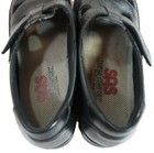 Black leather SAS Roamer women’s shoes with lace-up front, tan cushioned insole, and visible SAS logo on side.