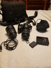 Nikon D3100 Camera With AF-S-18-55mm VR Lens and AF-S NIKKOR 50mm lens and more.