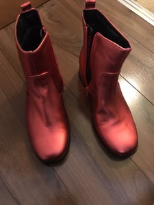 red metallic boots