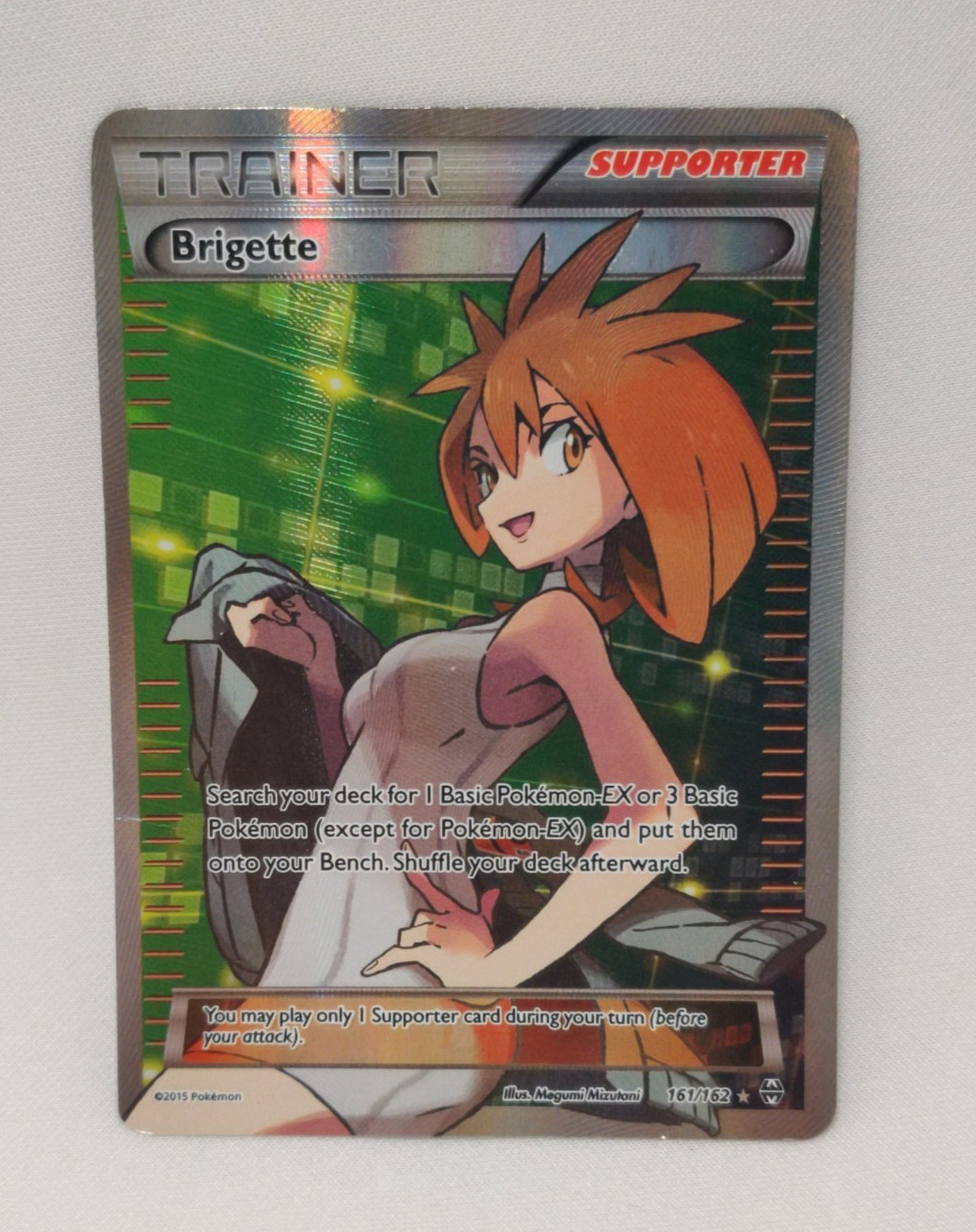 Brigette 161/162 Breakthrough Full Art Holo Pokemon Card Moderate Play
