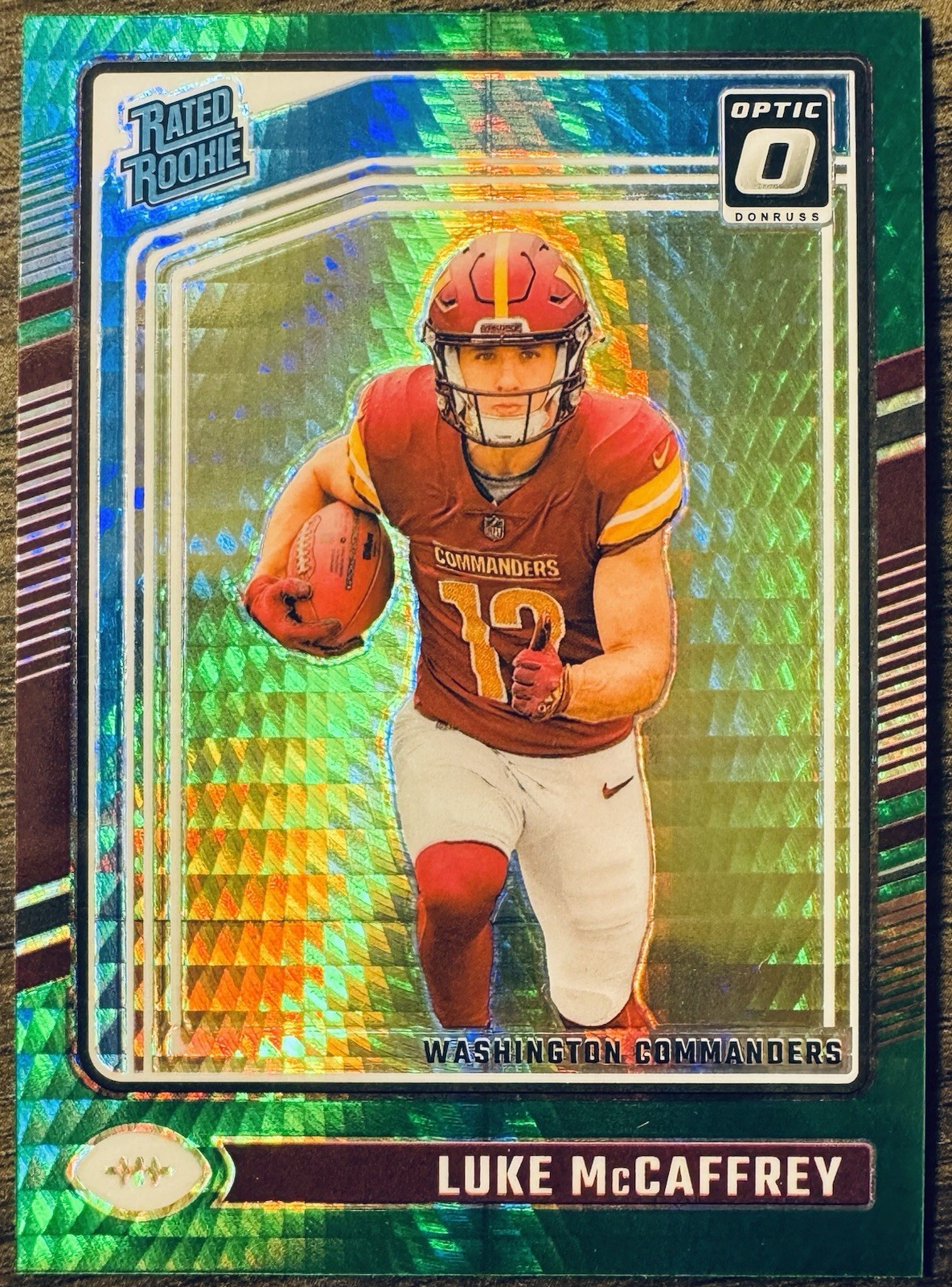 2024 Panini Donruss Optic Luke McCaffrey Rated Rookie Green Hyper Prizm #268
