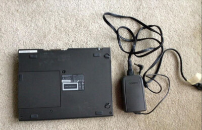 Compaq Armada 4150 computer parts, docking station, with power brick