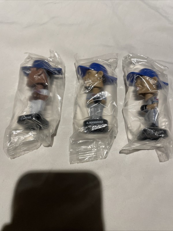 sports collectibles bobbleheads ( A-Rod texas, tori hunter)
