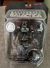 BATTLESTAR GALACTICA - Battle Damaged Cylon Pilot, 2009 NIB: FREE SHIPPING